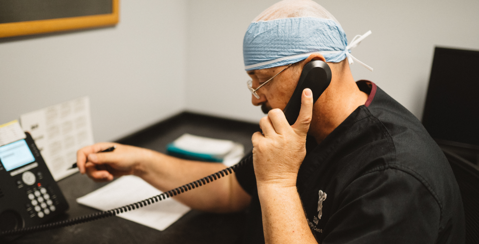Dr. Wobig on the phone at BSM Surgery Center